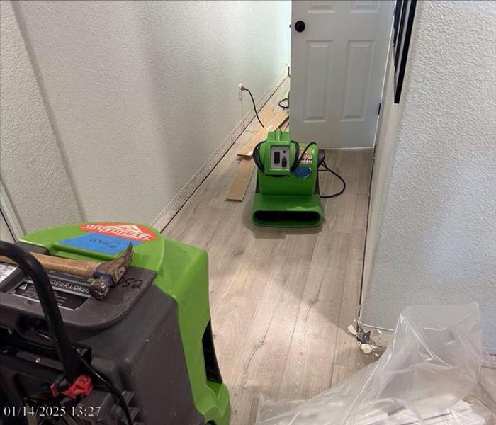 servpro equipment in the hallway 