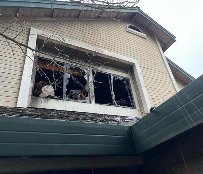 a window blown out by a house fire